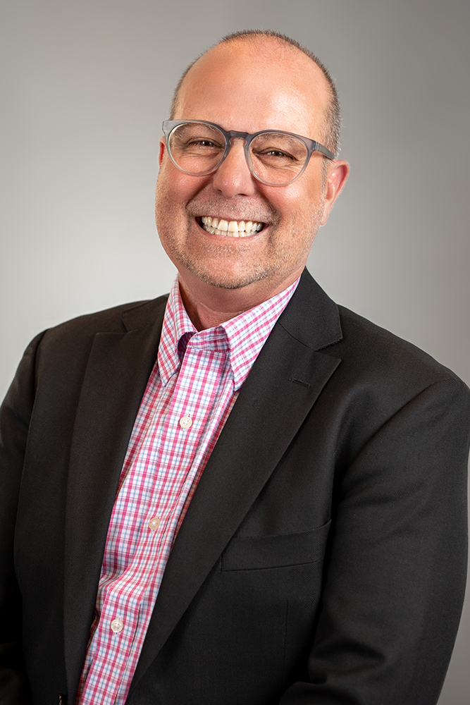 Professional headshots in New York, NY - a headshot of a corporate employee