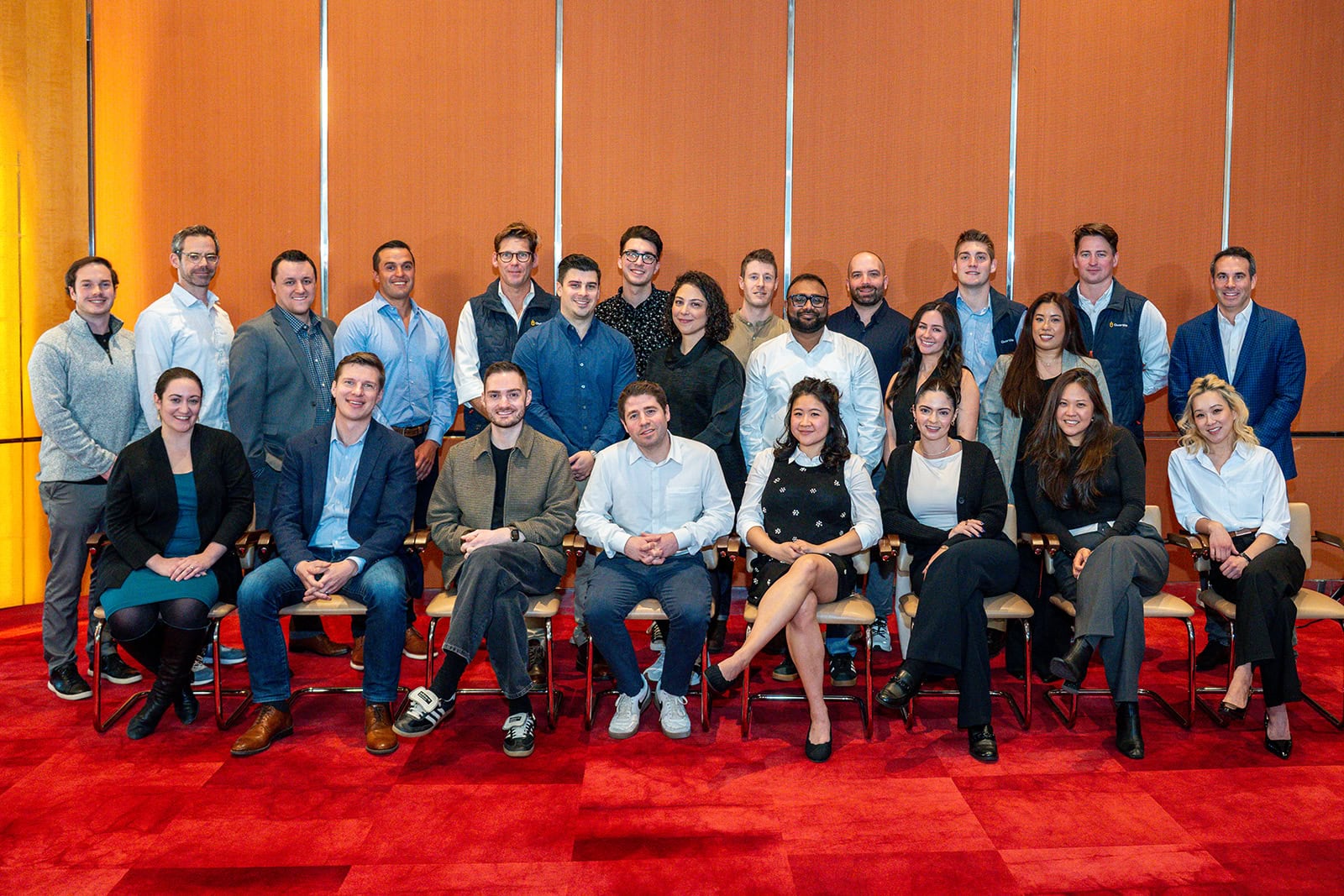 A real corporate group photo taken at a corporate event by Tatiana Valerie