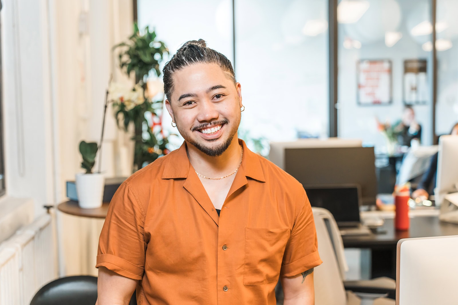 An environmental corporate headshot - a picture of a corporate employee at the office